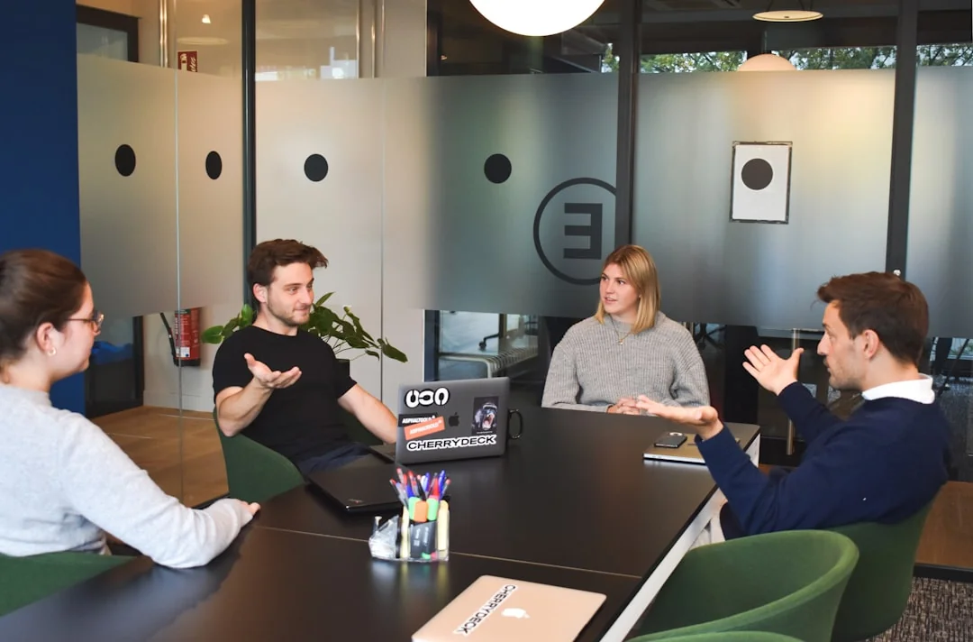 A contemporary workspace showcasing a laptop, tablet, and smartphones, ideal for tech and freelance use.